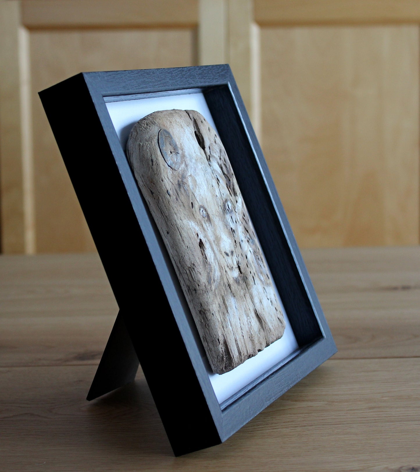 Icelandic ram.Acrylic painting on driftwood in a black frame.